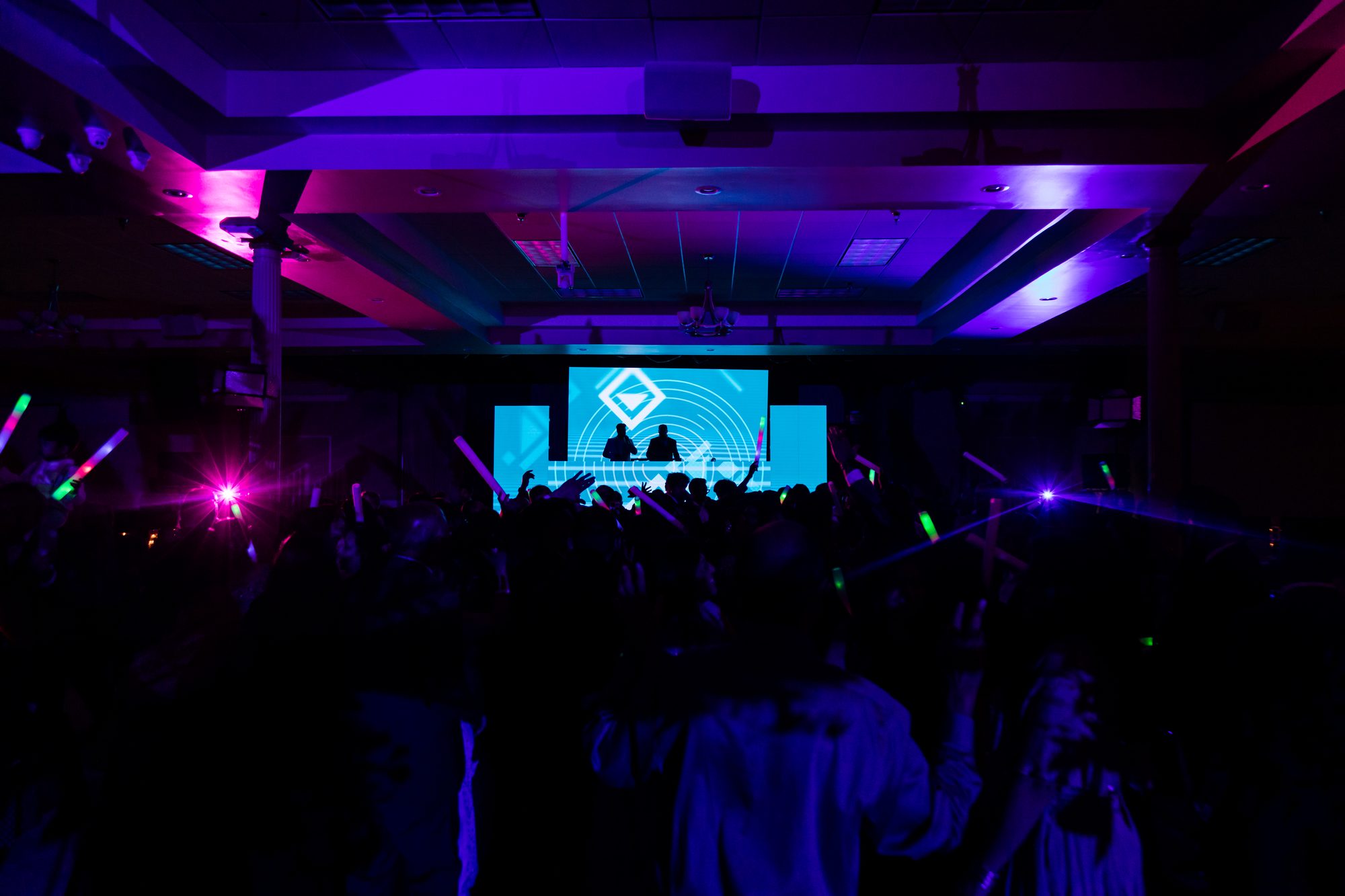 High-energy crowd during a DJ Rahul set