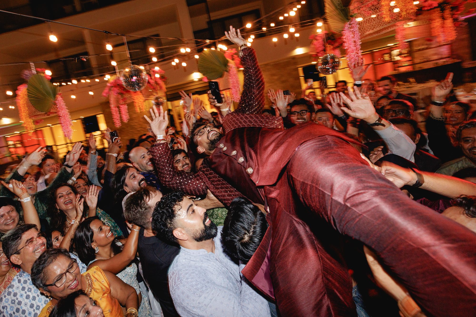 Packed dance floor at a luxury wedding reception